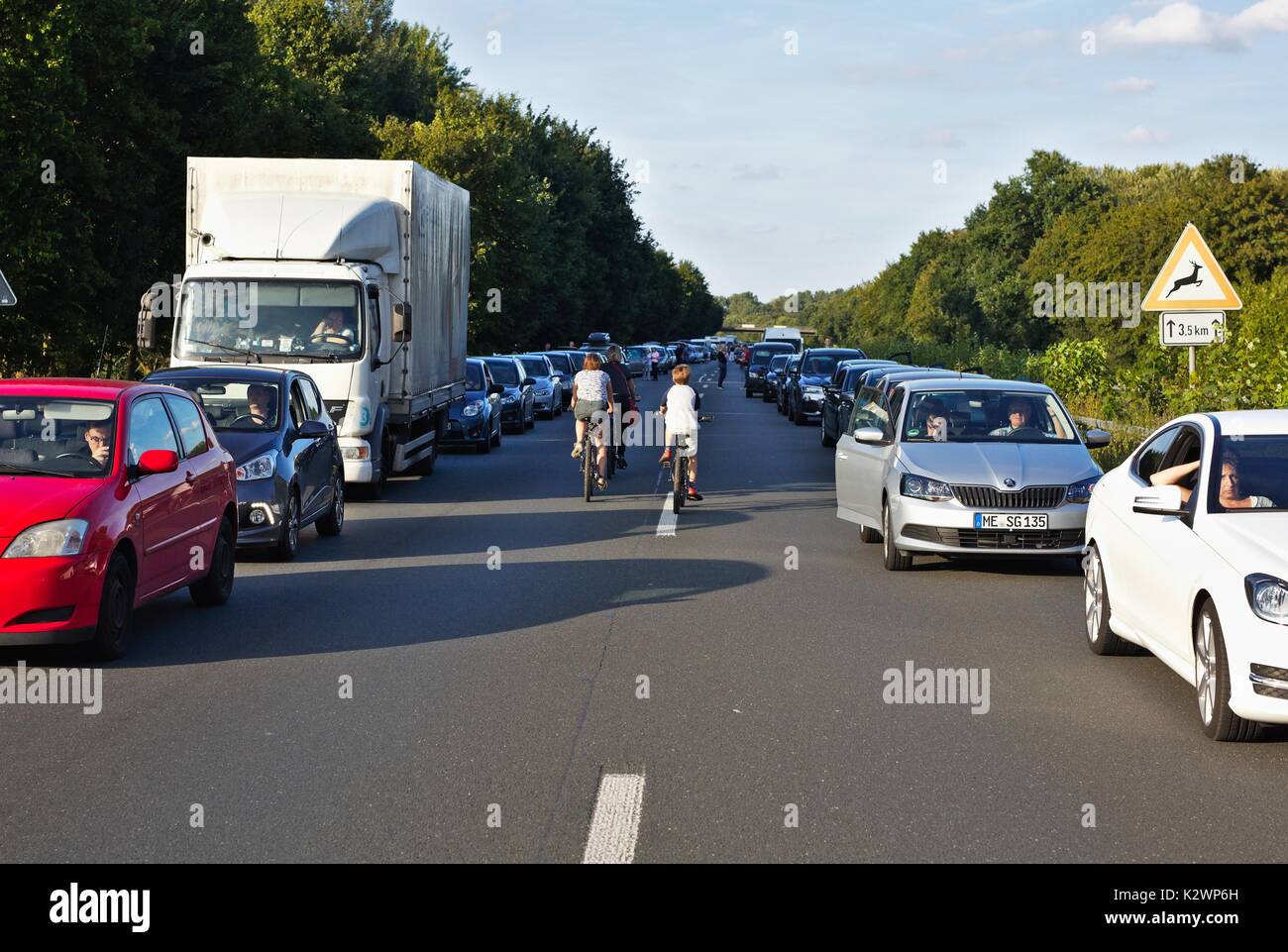 Cars on German motorway leaving a passage for emergency vehicles Stock Photo