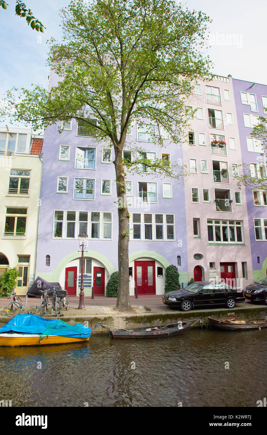 Holland, North, Amsterdam, Colourful modern canalside buildings. Stock Photo