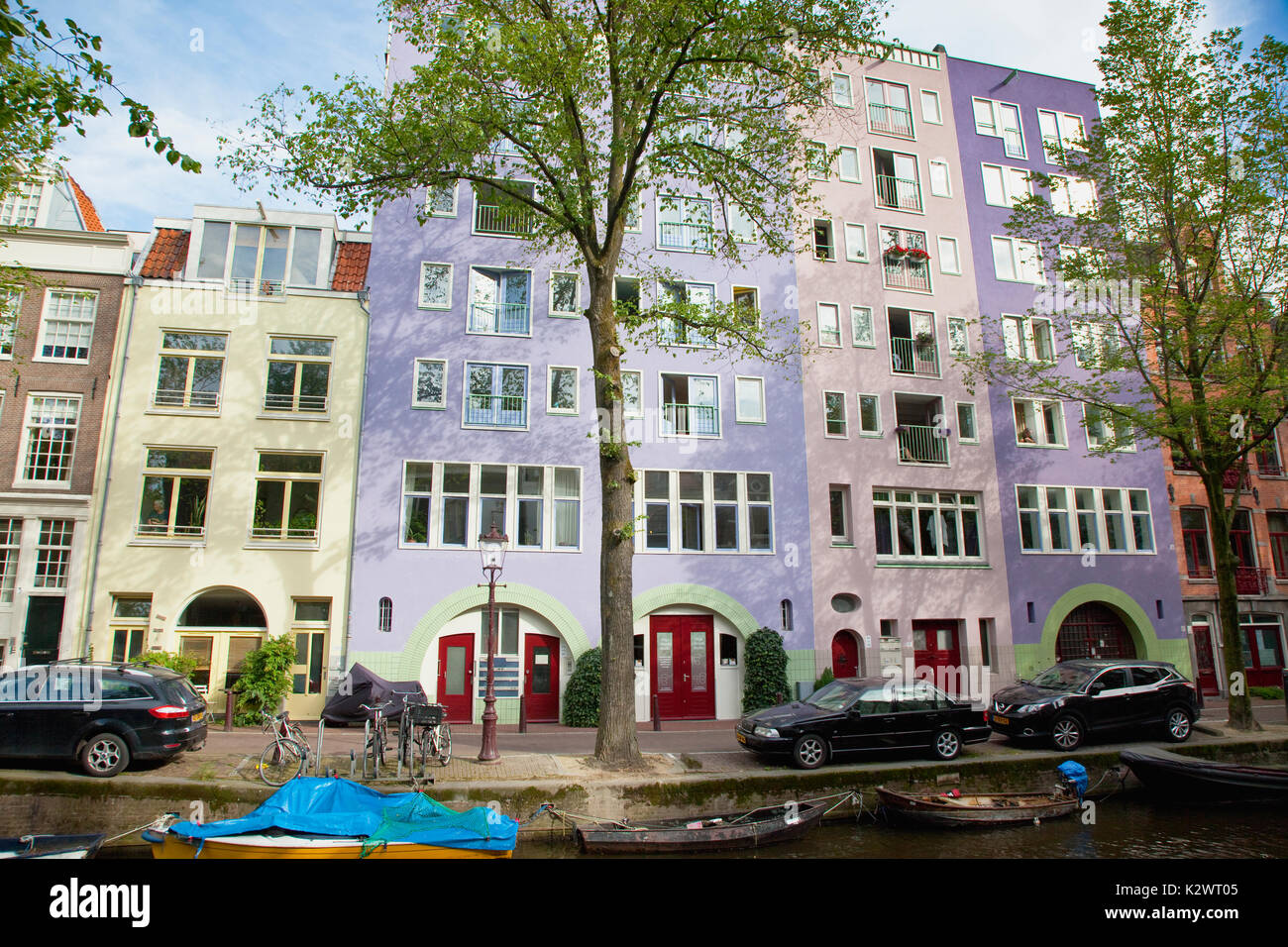 Holland, North, Amsterdam, Colourful modern canalside buildings. Stock Photo