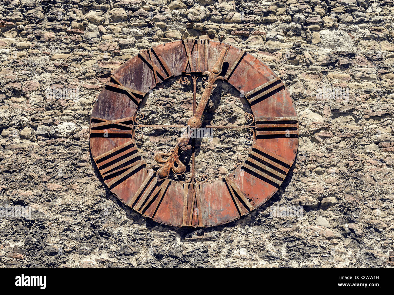 Clock Rusted Old rusty clock on the city wall. Close-up Stock Photo - Alamy