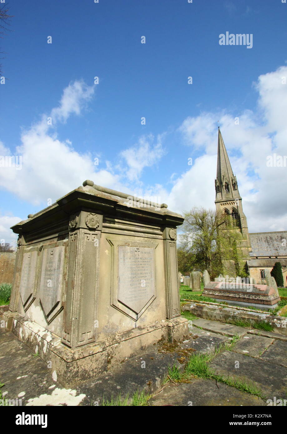 The alter tomb of renowned English gardener,  Sir Joseph Paxton in the churchyard of St Peter's (pictured), Edensor, Chatsworth Estate, Derbyshire,UK Stock Photo