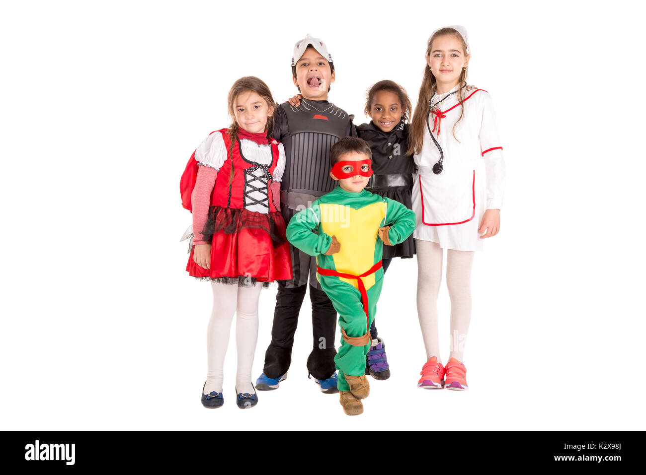 Group of kids in Halloween/Canaval costumes isolated Stock Photo - Alamy