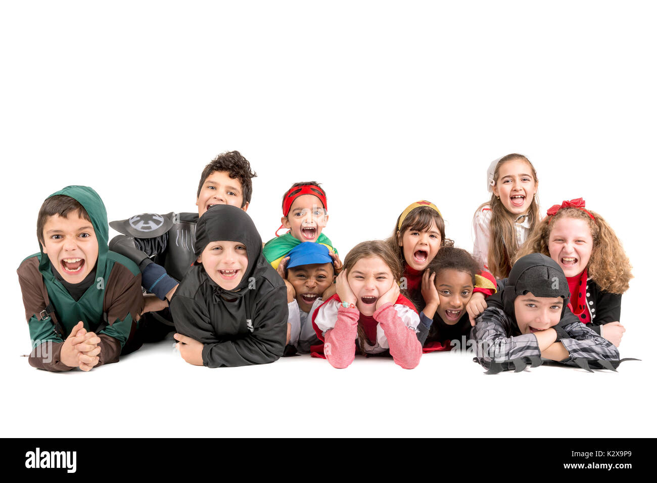 Group of kids in Halloween/Canaval costumes isolated Stock Photo - Alamy