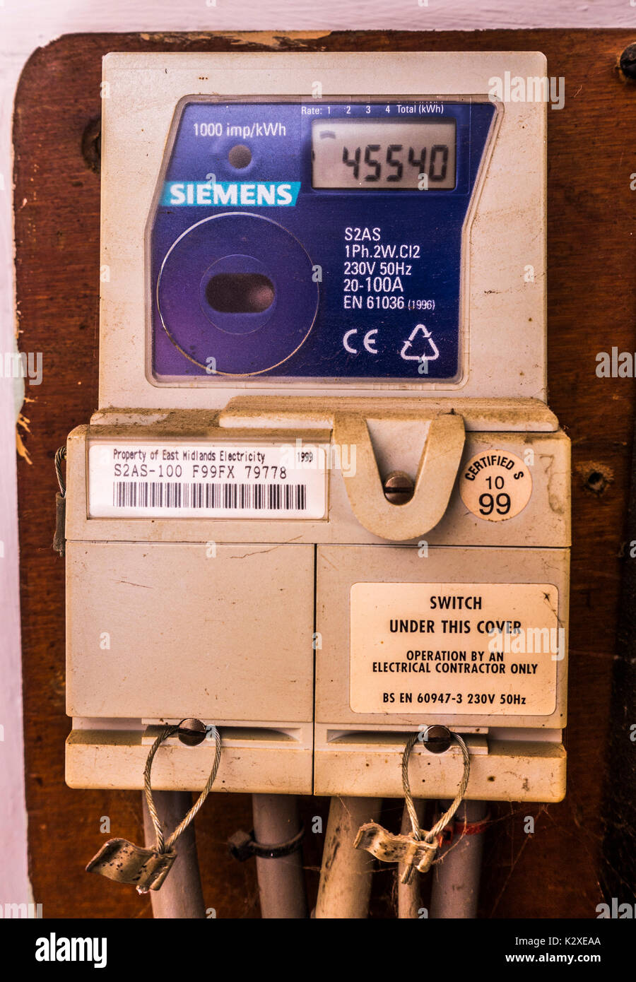 A Siemens electricity meter with consumption reading displayed, for the supply to a residential property. East Midlands, England, UK. Stock Photo
