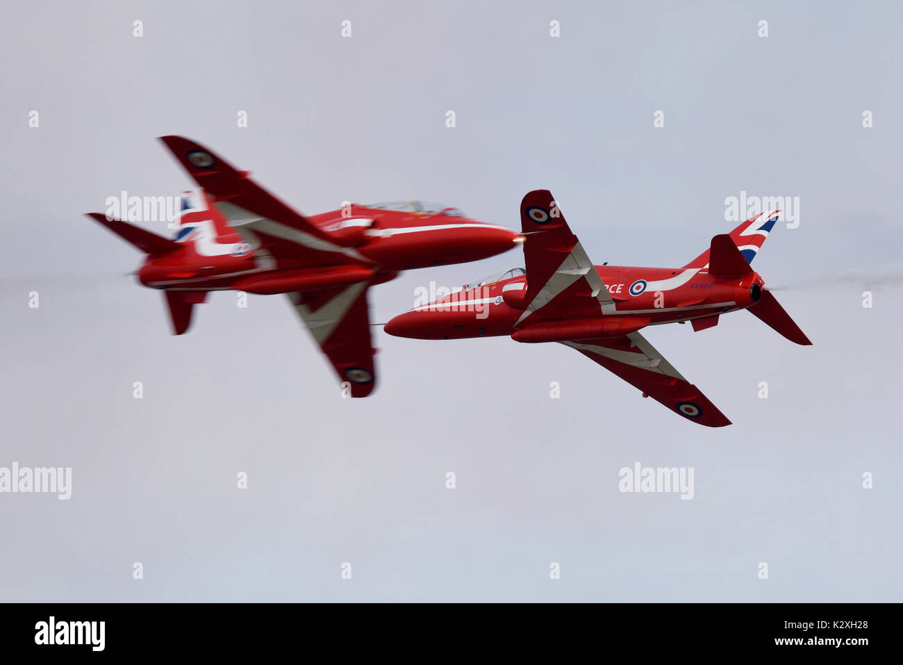 Red Arrows opposition pass at Clacton Airshow. Space for copy Stock
