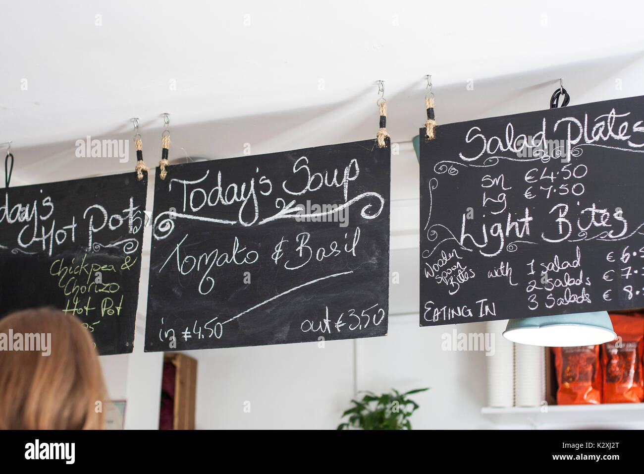 Cafe menu chalkboard hanging from ceiling the special, black white