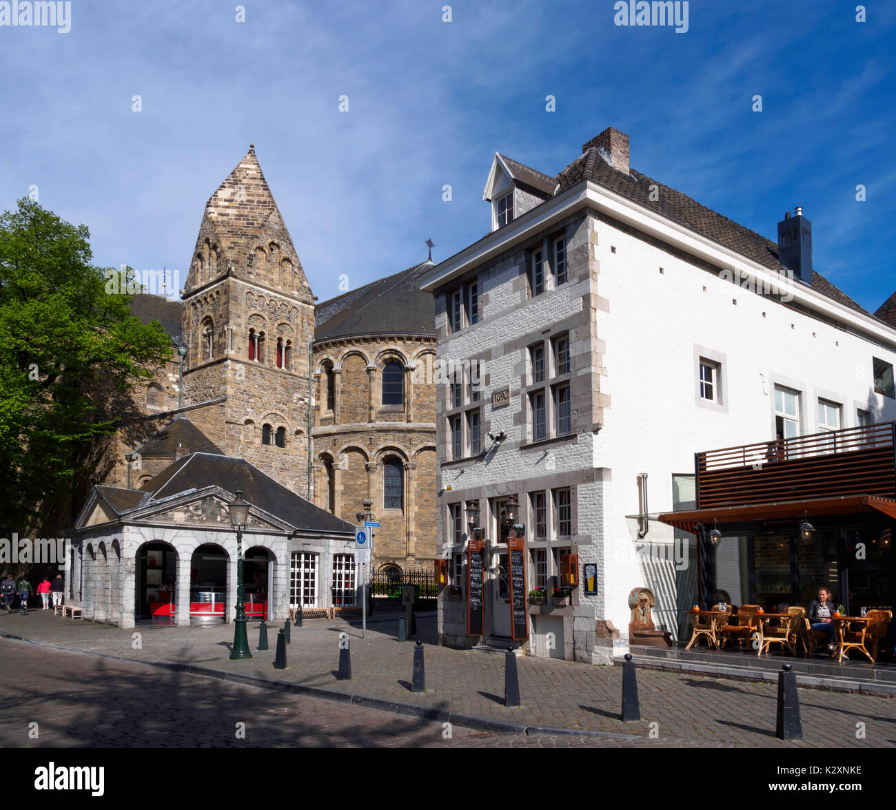 Basilica of Our Lady, apse and Barbara Tower, former military guardhouse, and a 17th century house on the street Onze Lieve Vrouweplein Stock Photo