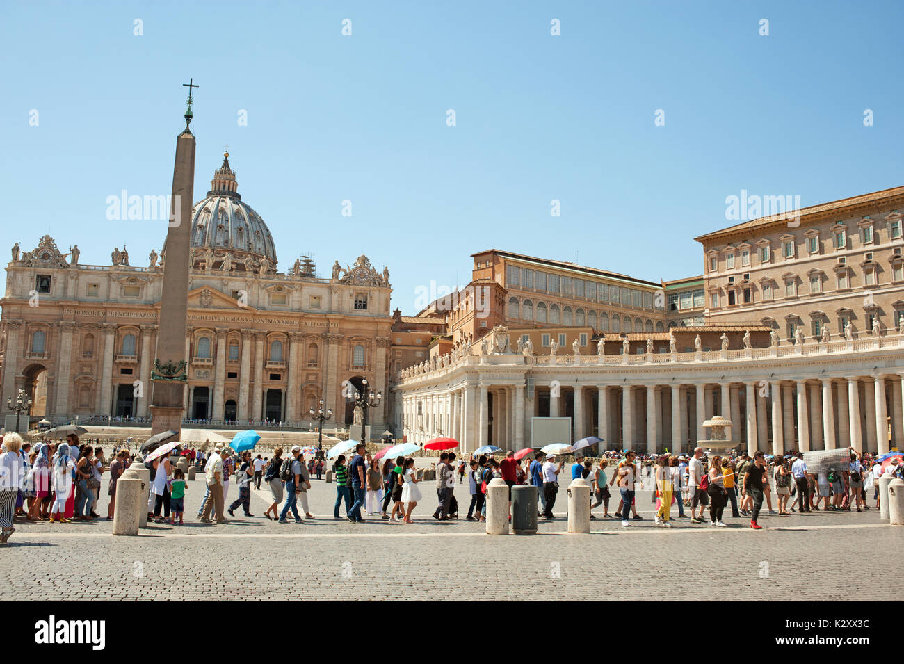 Rome, Italy, 2017 - Tourists standing in a line to enter St. Peter's church Stock Photo