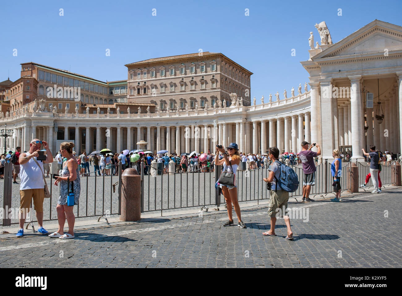 Rome, Italy, 2017 - Tourists in Saint Peter square Stock Photo