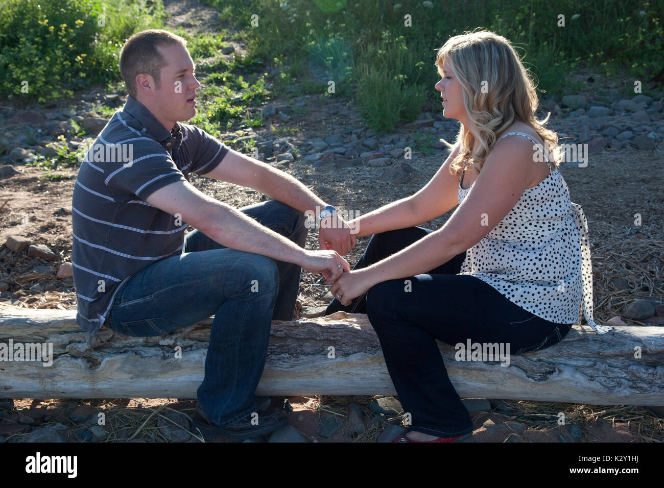 Couple sitting across from each other hires stock photography and