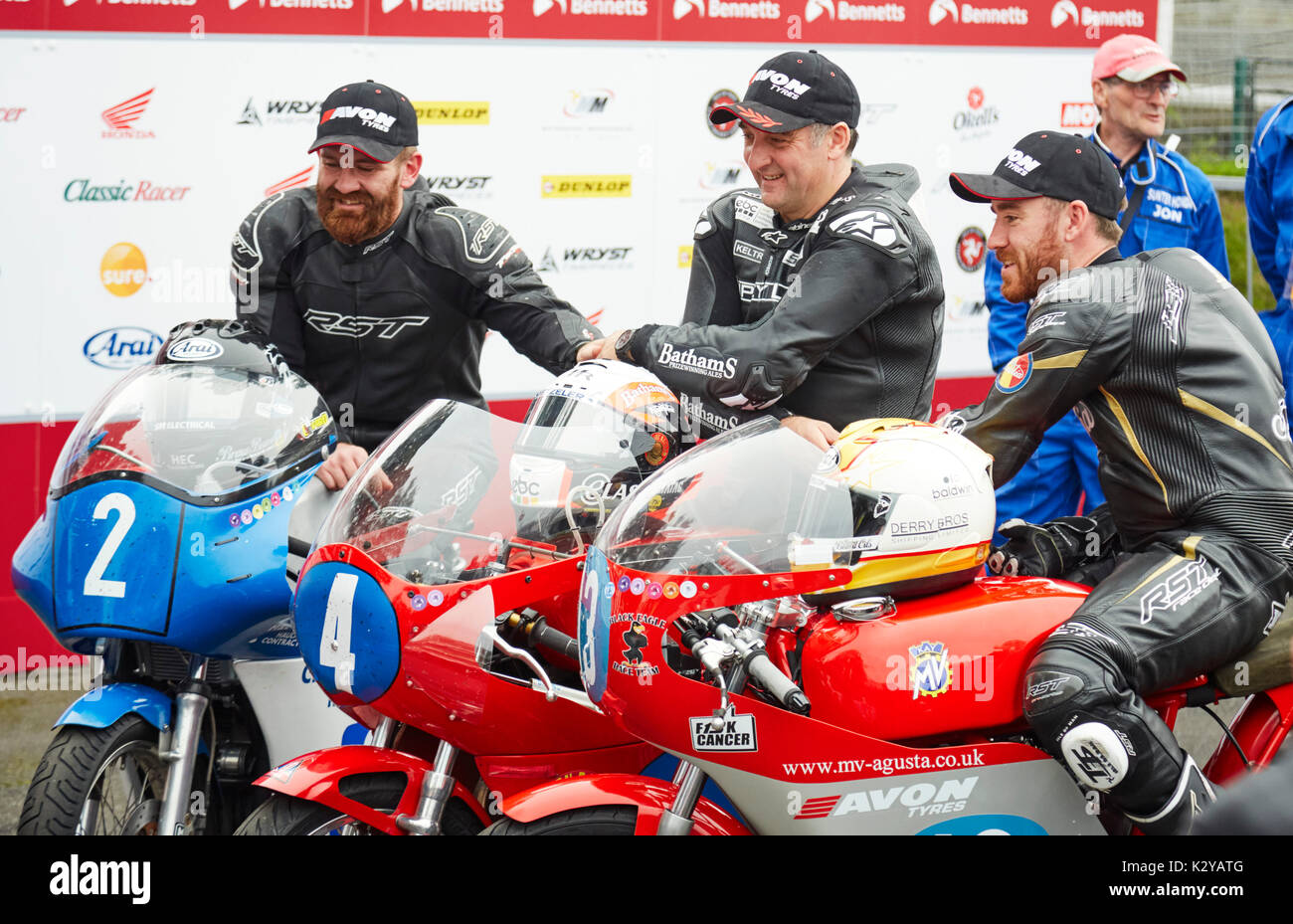 Winners of the 2017 Manx Junior Classic TT race pose for camera. Left (third) Jamie Coward, centre (winner) Michael Rutter and right (second) Lee John Stock Photo