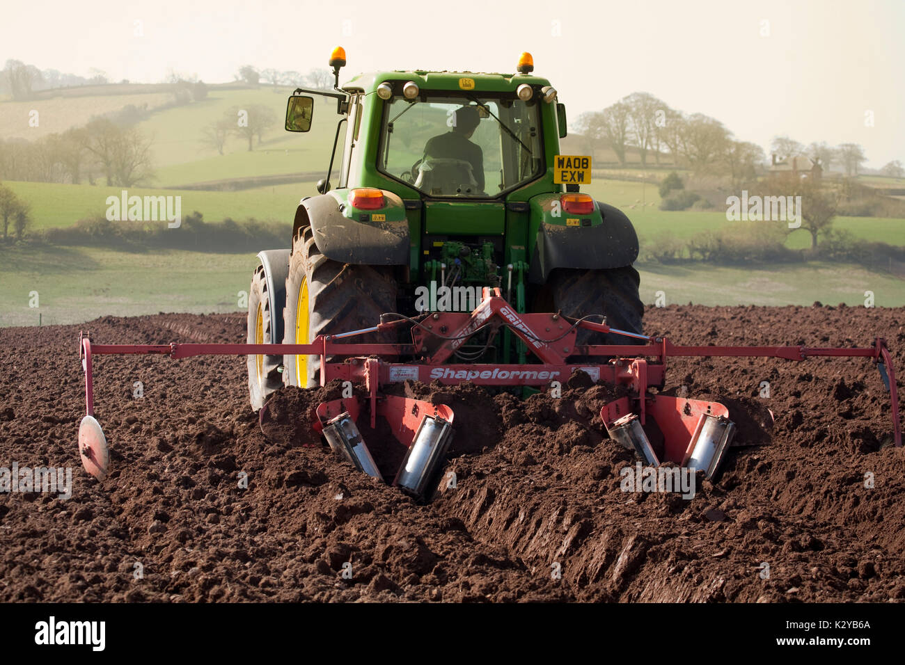 Preparing and planting organic potatoes Stock Photo Alamy