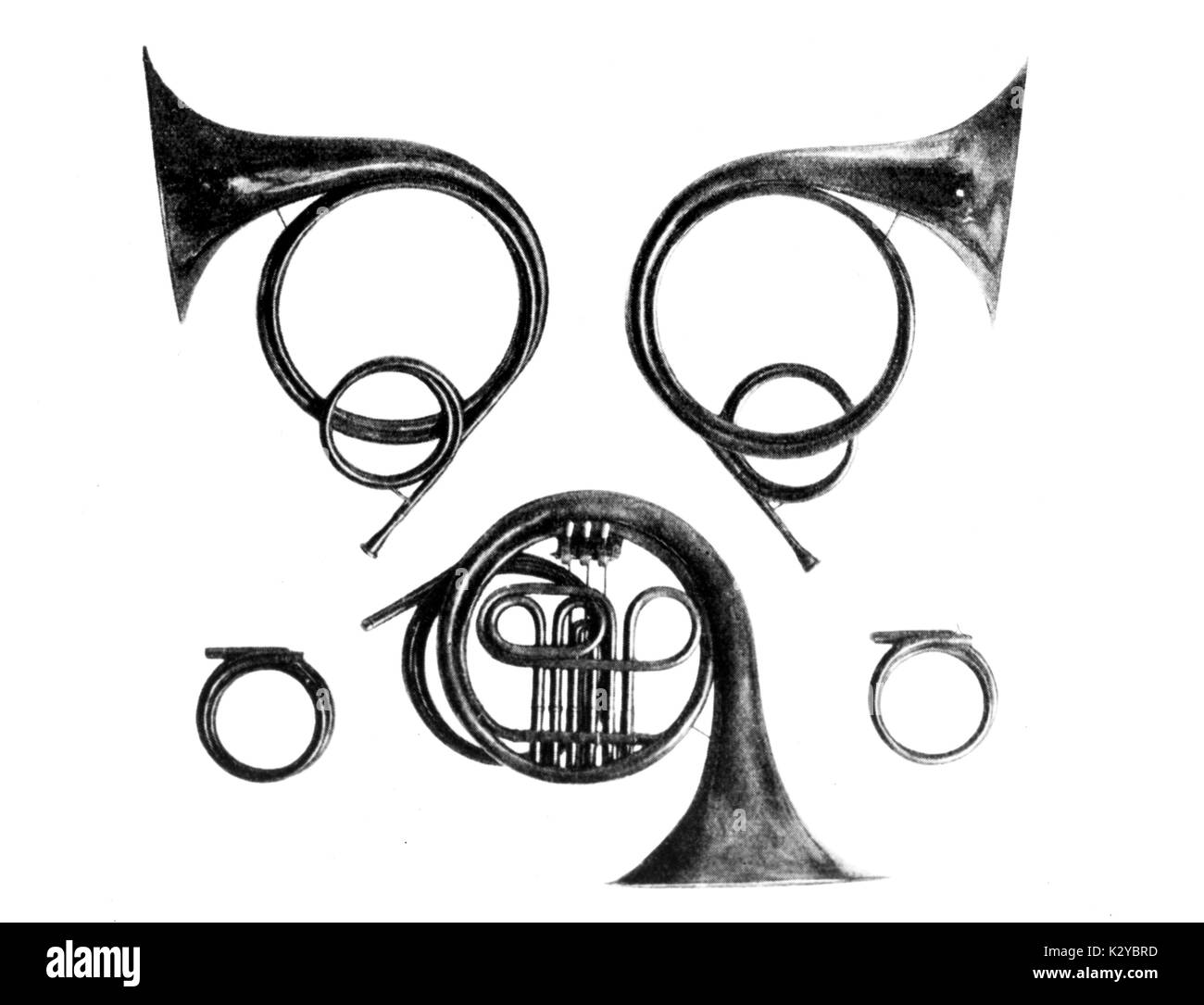 Valvehorn in F (with 3 valves and 2 crooks); and 2 valveless natural horns by Joseph Riedel, Vienna, c.1830 Stock Photo