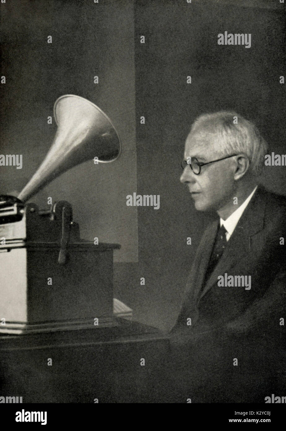 Bela Bartok at Institute of Folklore, Bucharest, 1934, listening to recordings he has made of folk music.  Hungarian composer & pianist, 1881-1945 Stock Photo