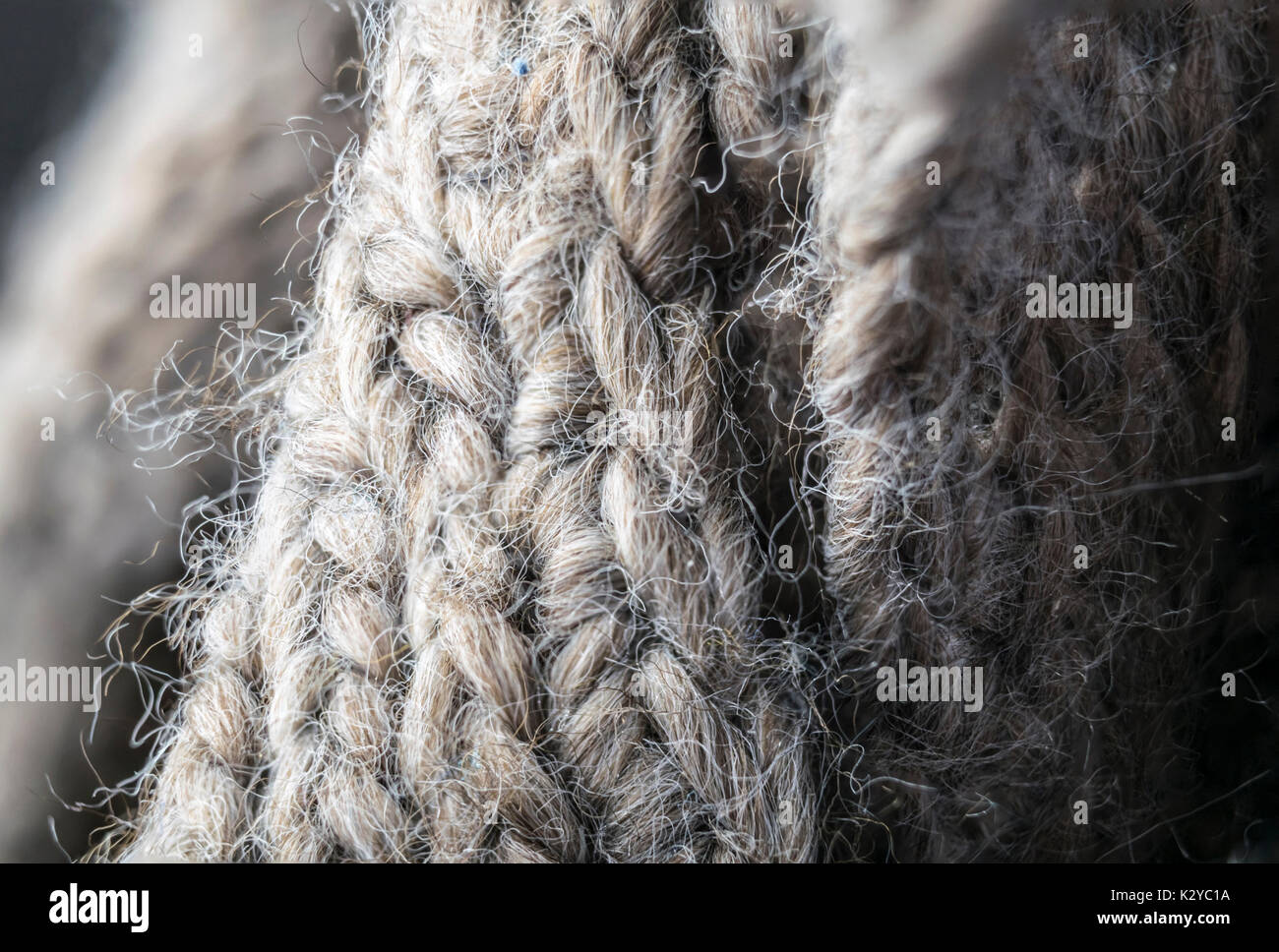 highly detailed needlework wool fabric, close up wool texture background. Stock Photo