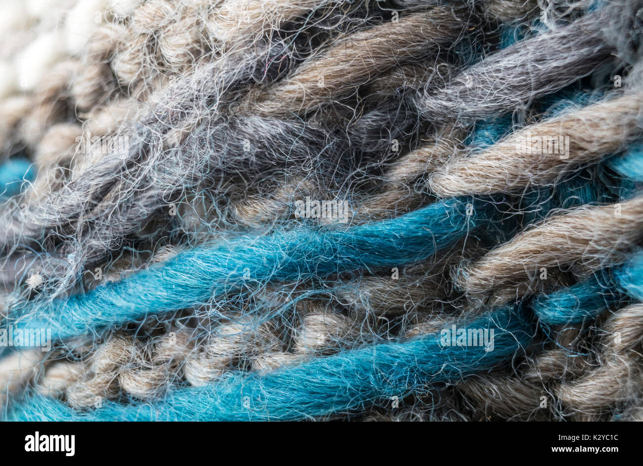 highly detailed needlework wool fabric, close up wool texture background. Stock Photo