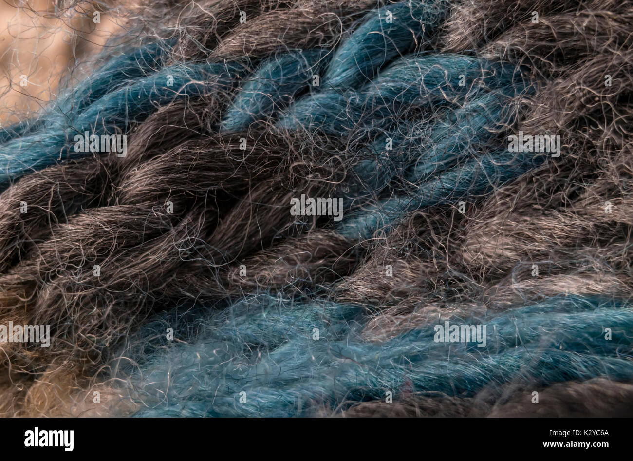 highly detailed needlework wool fabric, close up wool texture background. Stock Photo