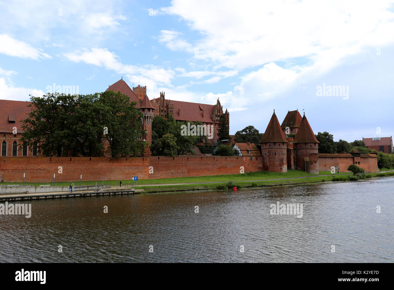 The Nogat river and Malbork Castle, which was built by the Teutonic Knights in the town of Malbork, Poland, photographed on 21 August 2017 Stock Photo