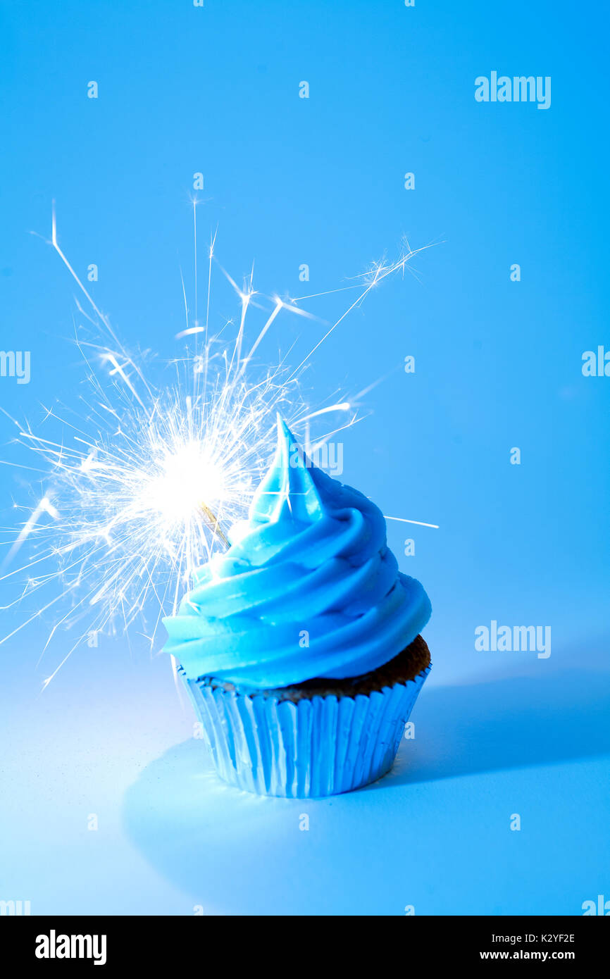 Blue Sparkler Cupcake Stock Photo