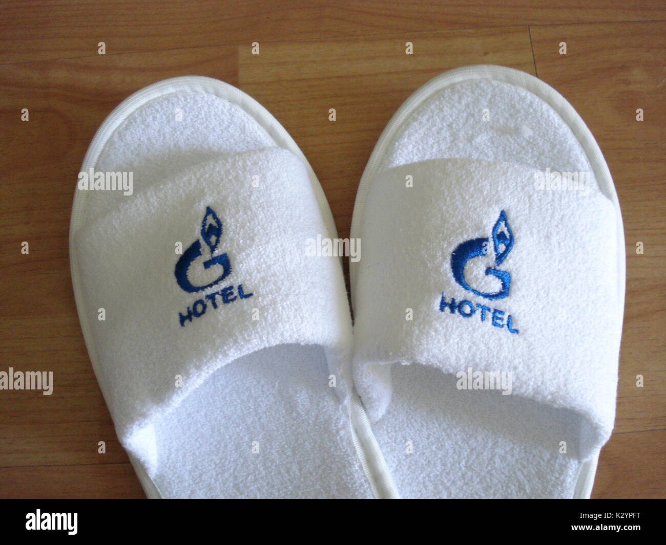 Slippers with the emblem of Gazprom, russian gas monopoly, in hotel of  Russia who belong to the company Stock Photo - Alamy