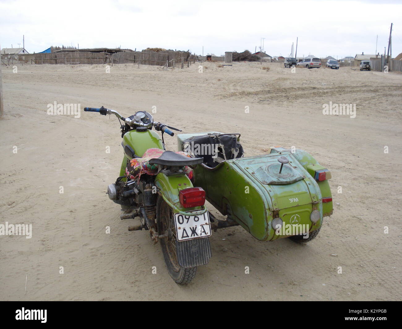 Ural sidecar motorbike in a village of Kazakhstan, near Aral Sea Stock Photo