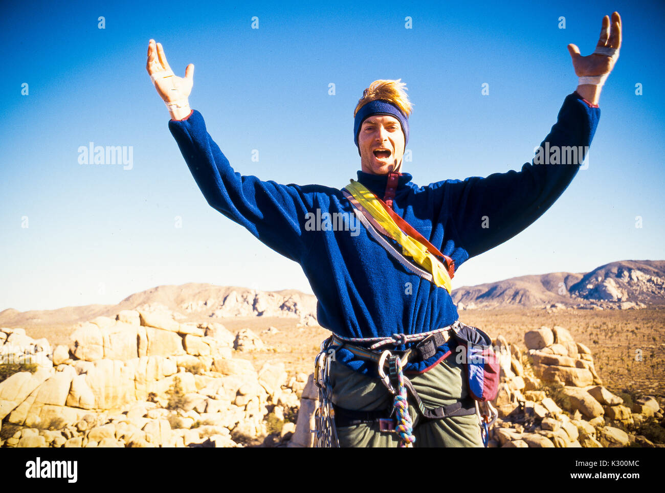 Male climber celebrating victory hi-res stock photography and images ...