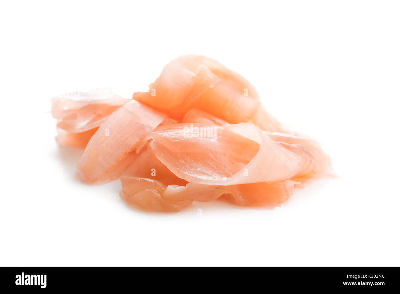 Pickled sushi ginger slices isolated on white background. Stock Photo