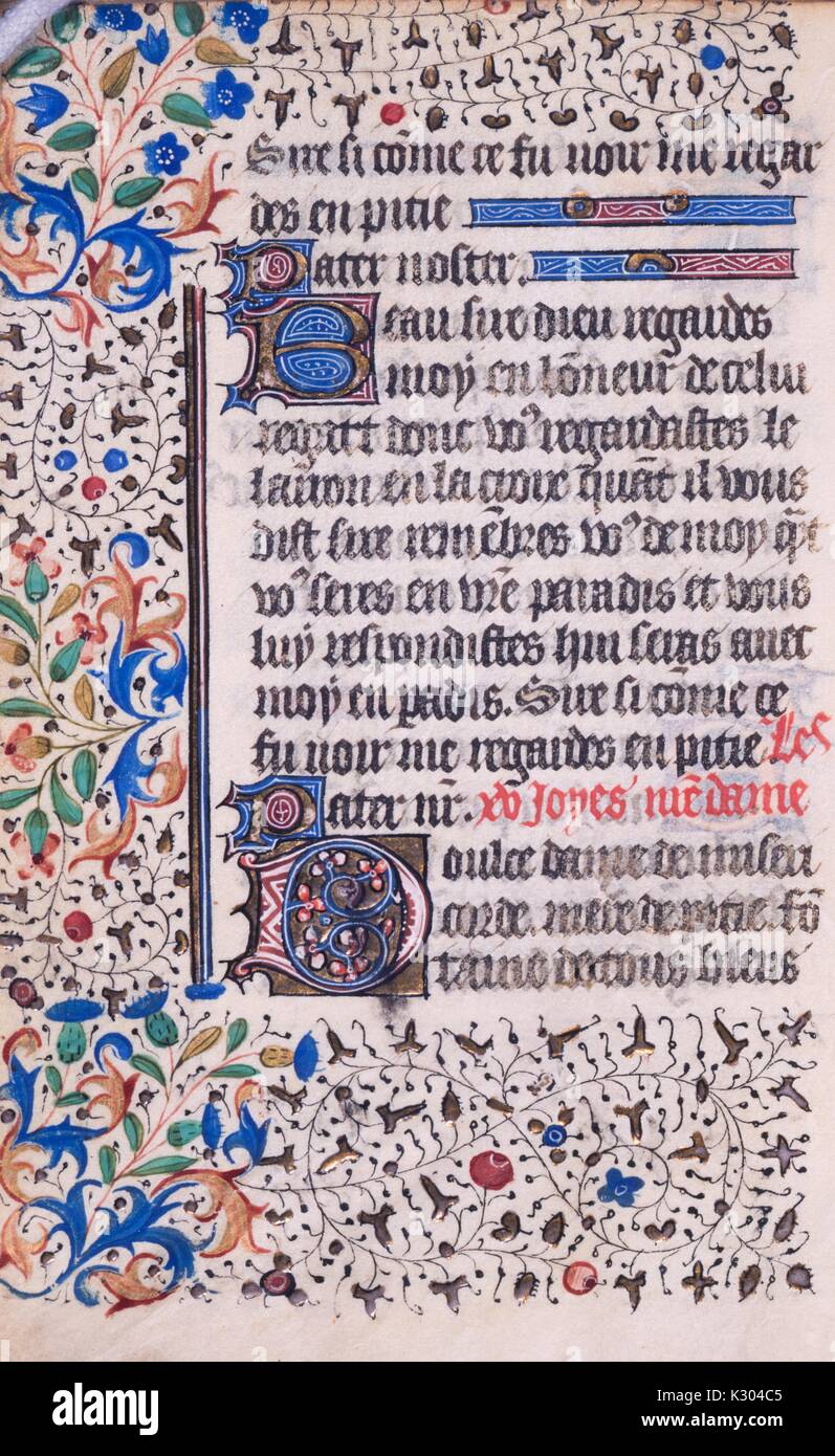 Illuminated manuscript page of prayer with ornamental plants and vines, from the 'Initium sancti euangelii secundum iohannem, gloria tibi domine, ' a 15th century Latin book of hours, 2013. Stock Photo
