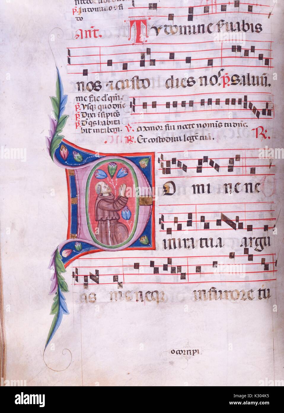 Illuminated manuscript page of song with man rejoicing, from the 'Incipit antiphonarium nocturnum, ' a 15th century Latin antiphonary of the Catholic Church, 2013. Stock Photo