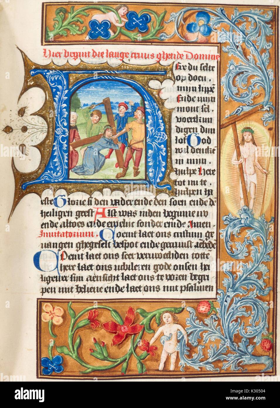 Illuminated manuscript page depicting Jesus Christ holding a crucifix on his back, from the 'Hier beghint die vrouwe ghetide Domine, ' a 15th century Dutch book of hours, 2013. Stock Photo