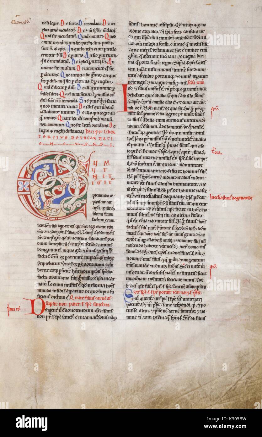 Illuminated manuscript page of religious text in Latin from 'Petrus Lombardus libri IV Sententiaru' of the 12th century in Paris, 2013. Stock Photo