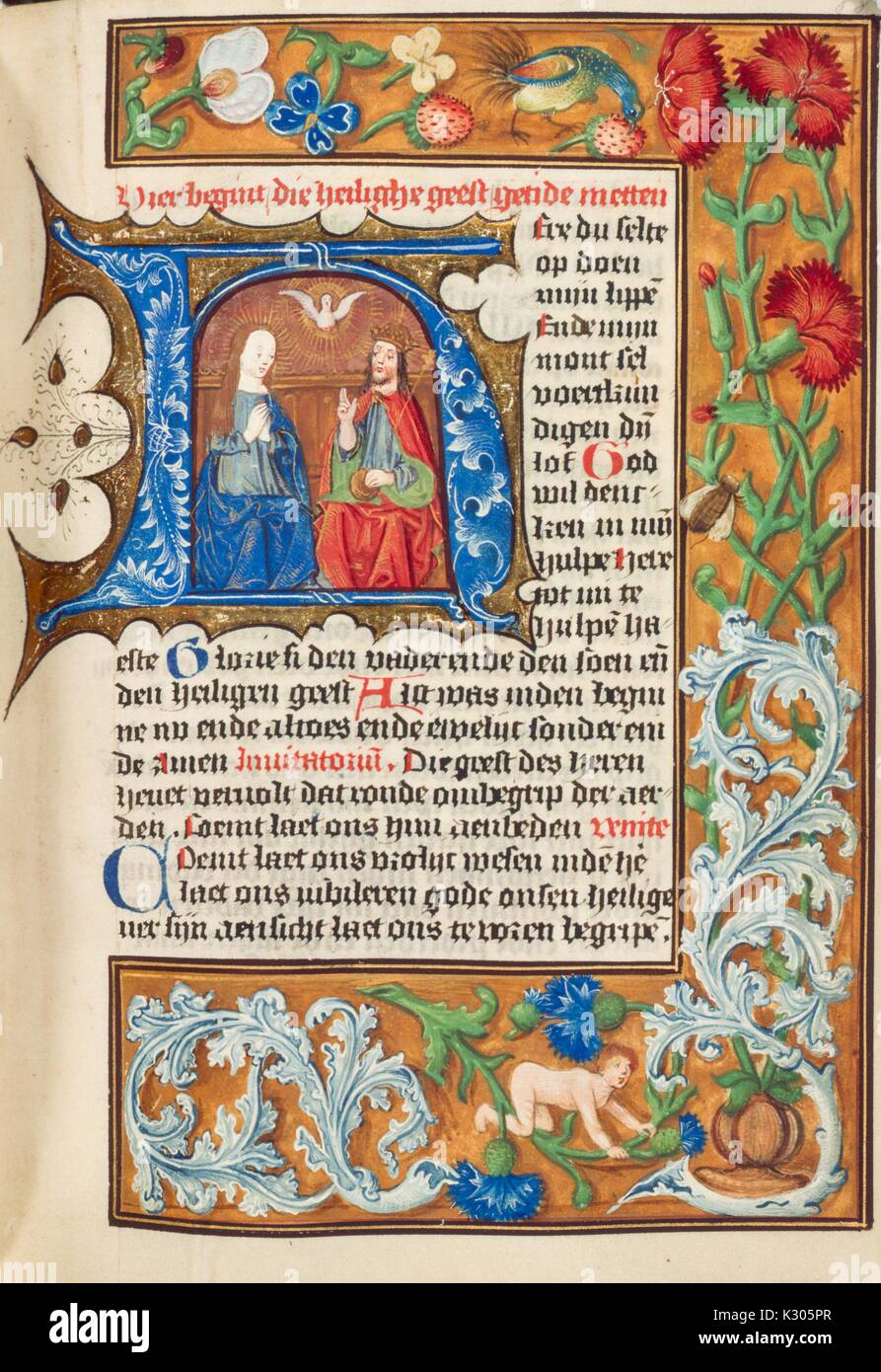 Illuminated manuscript page depicting Jesus Christ with the Blessed Virgin and a white dove, from a 15th century Dutch book of hours, 2013. Stock Photo