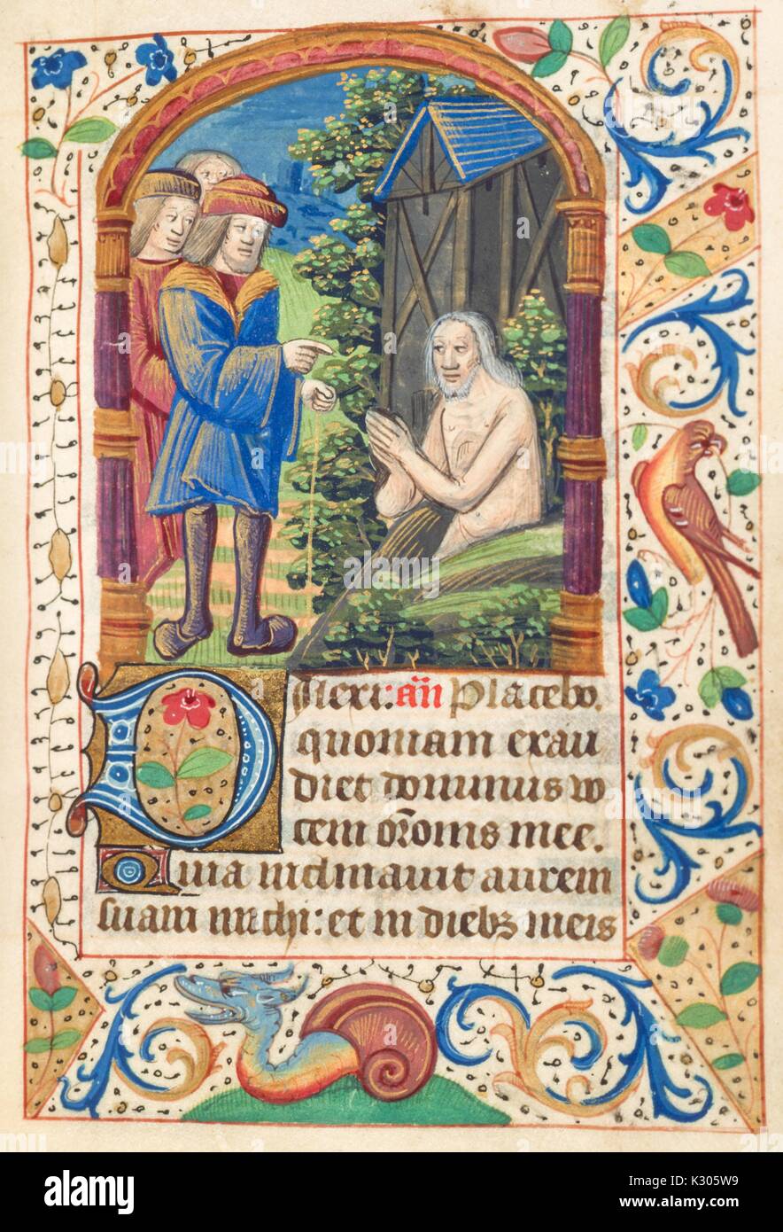 Illuminated manuscript page depicting a poor beggar and three noble men, from the 'Missale Romanum, ' a 15th century Latin book of hours, 2013. Stock Photo