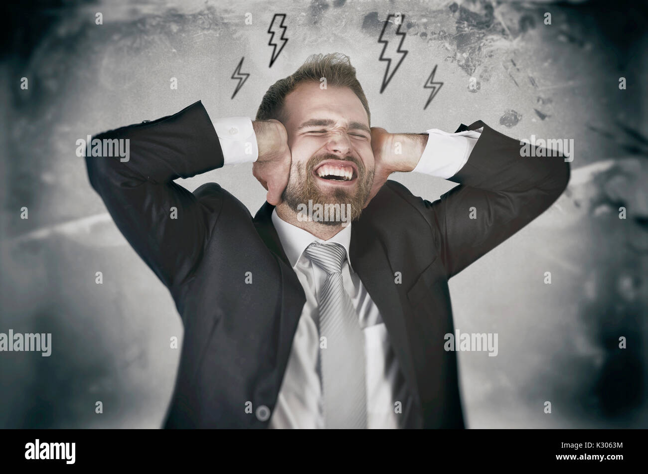 Employee hate his work and, screaming and covering his ears. angry businessman stress work job furious business overload concept Stock Photo