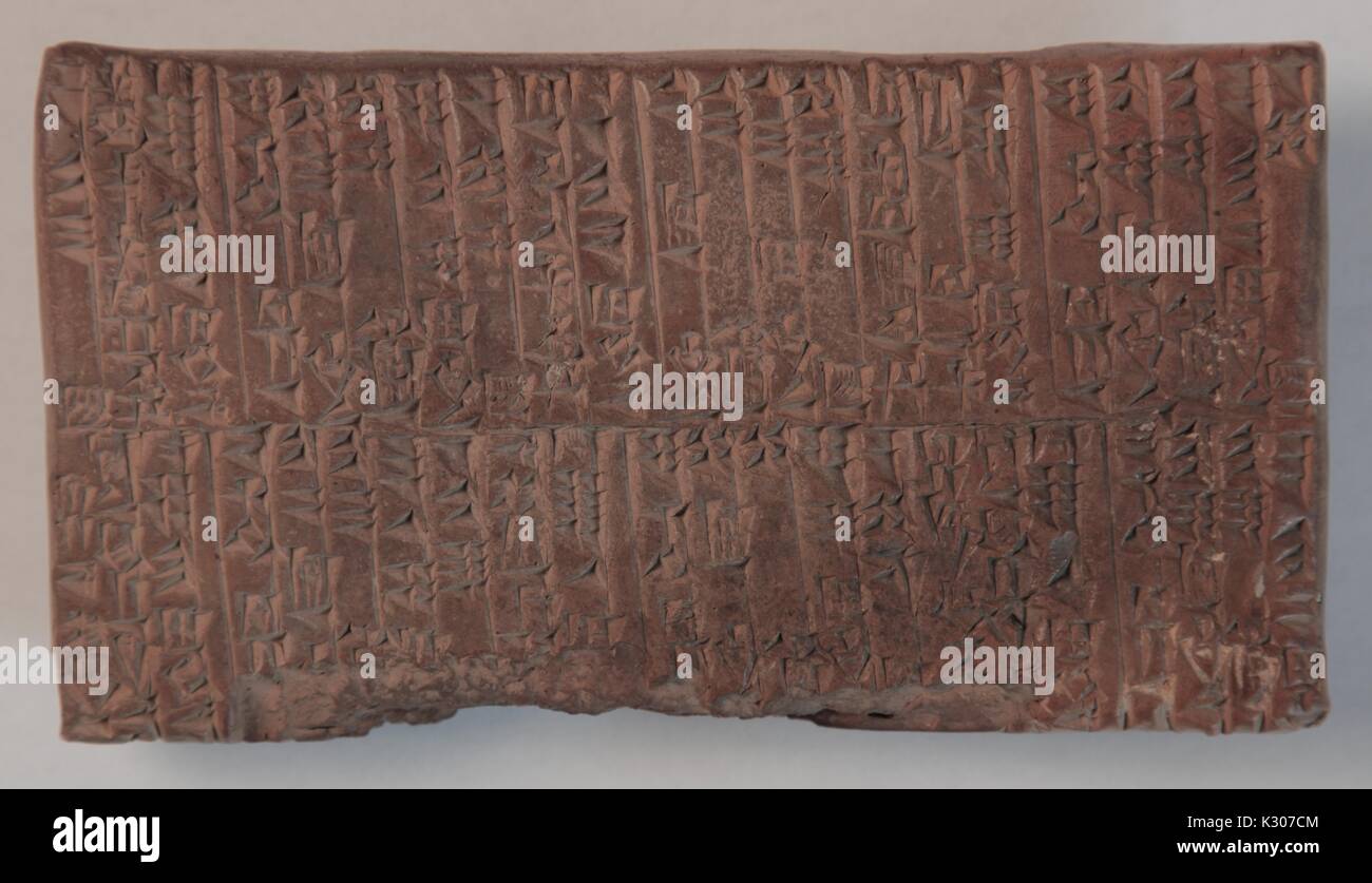 Cuneiform tablet, which originally served as an administrative text, documenting the transfer of goods, from the Ur III Period, c, 2011. 2200-2100 BCE, currently in the collection of the George Peabody Library. Stock Photo