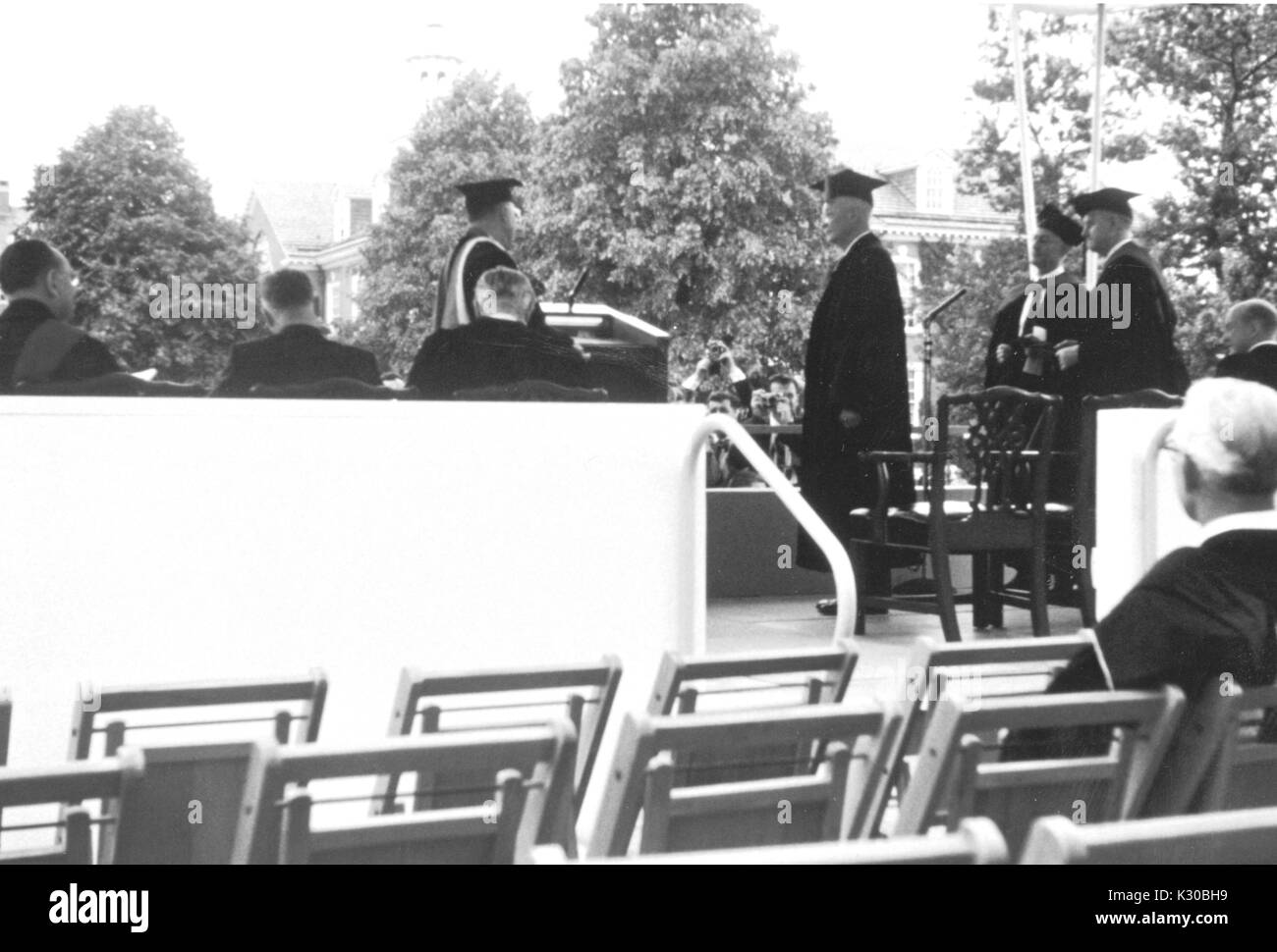 Then President of the United States of America Dwight D Eisenhower receives an honorary degree from his brother and then President of Johns Hopkins University Milton S Eisenhower during the University's class of 1958 commencement ceremony in Baltimore, Maryland, June, 1958. Stock Photo