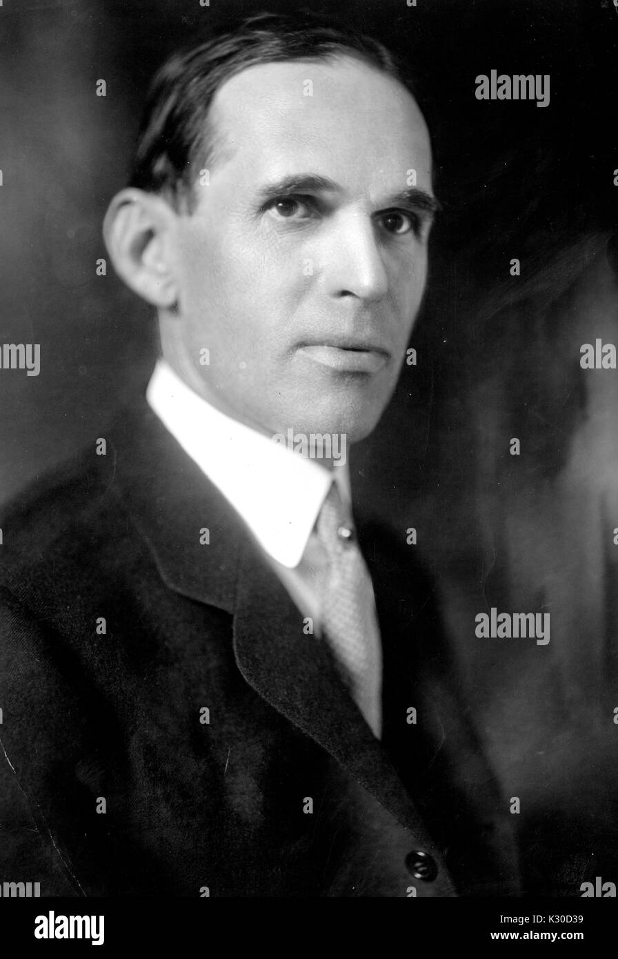 Portrait, shoulders up, of Walter Wheeler Cook, visiting professor of jurisprudence at Johns Hopkins University, slightly turned with stern face, Baltimore, Maryland, 1928. Stock Photo