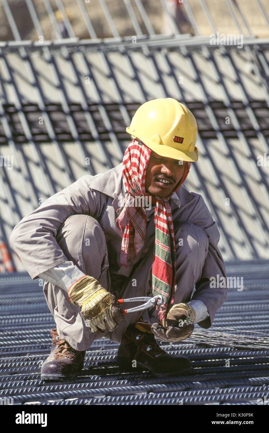 Foreign laborers at work on a construction project in central Riyadh. Stock Photo