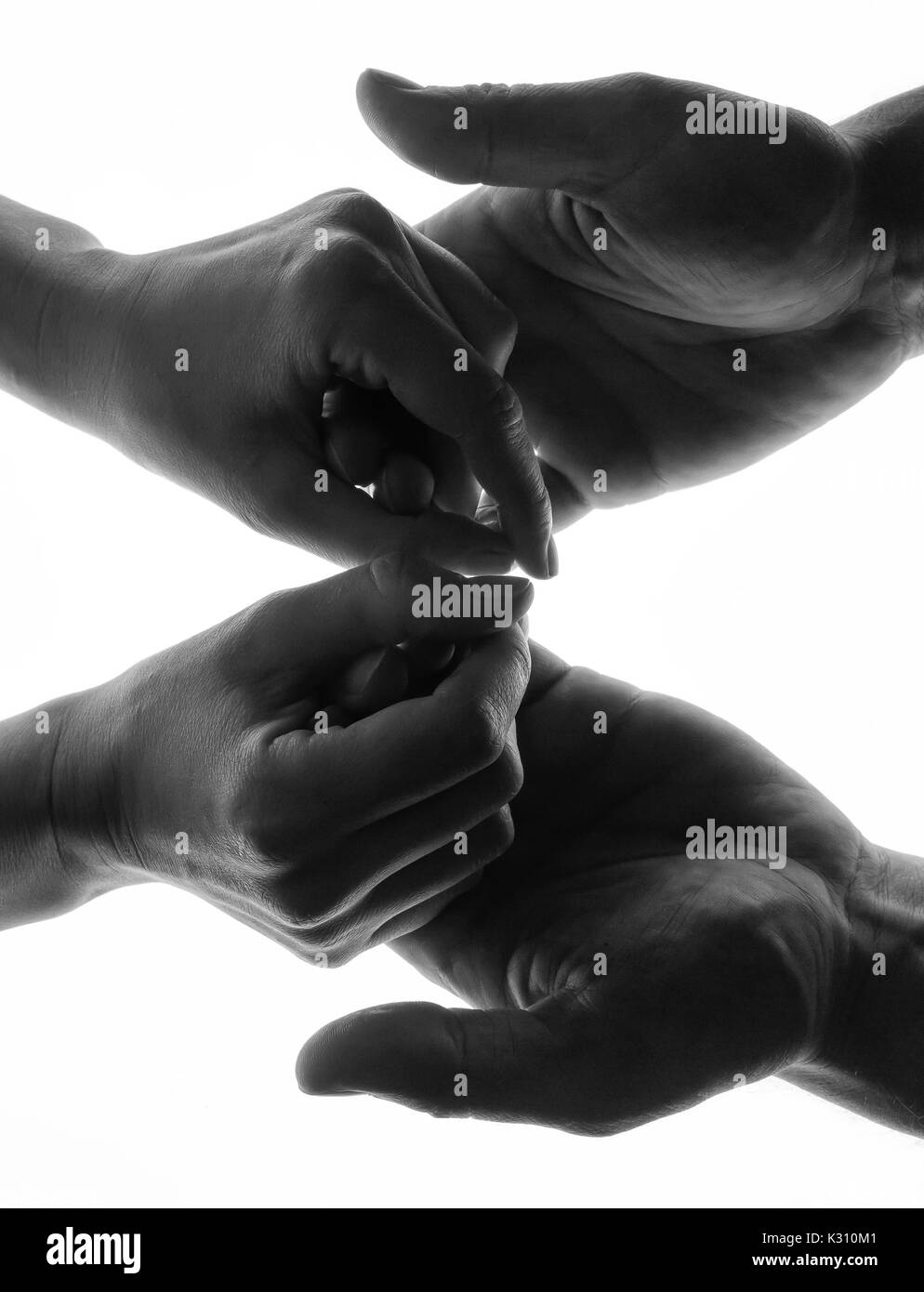 Man woman hold hands silhouette white background. Stock Photo
