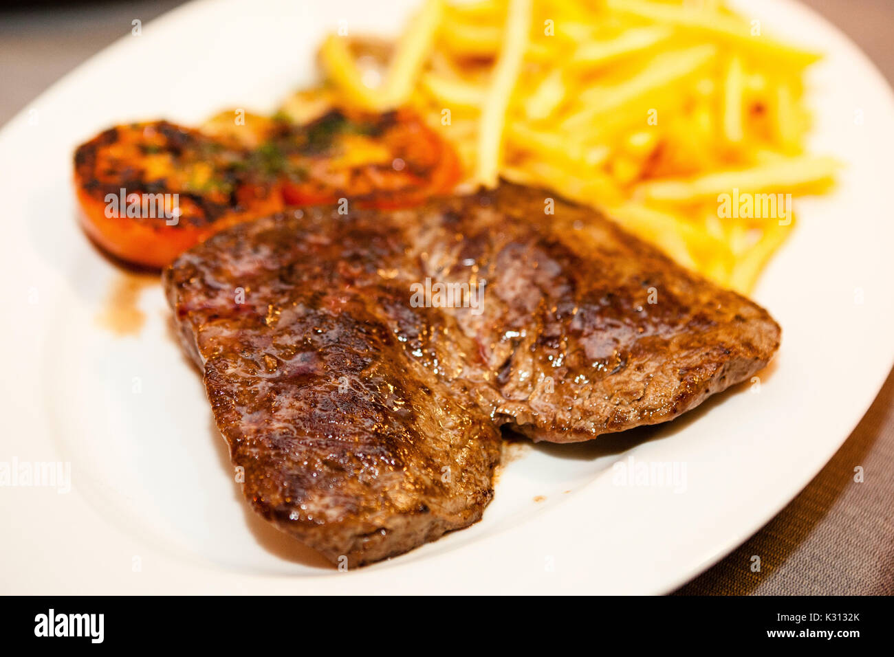 Steak with potatoes Stock Photo - Alamy