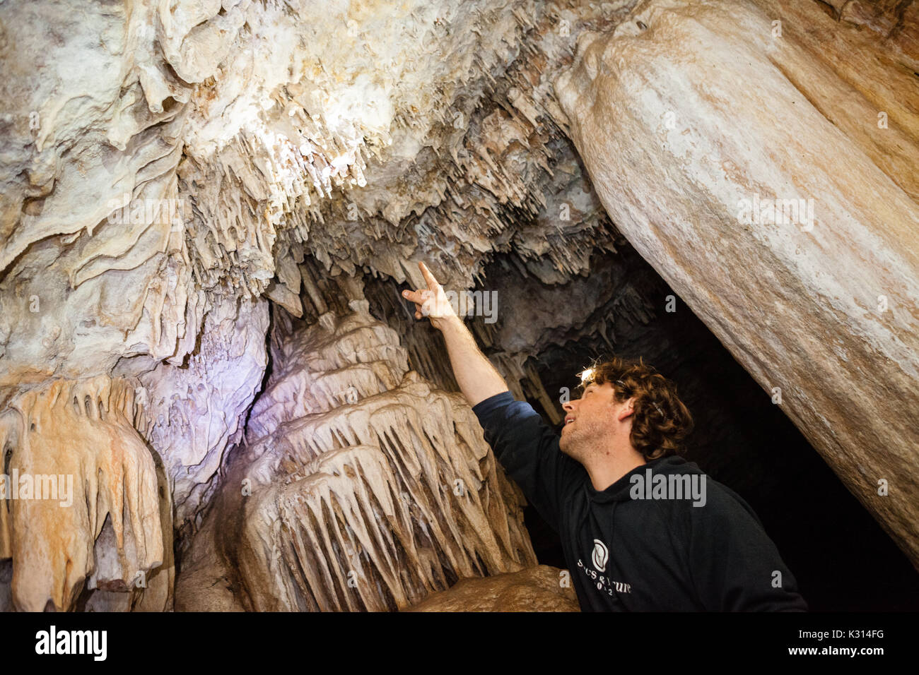 Exploring a cave in Menorca Stock Photo