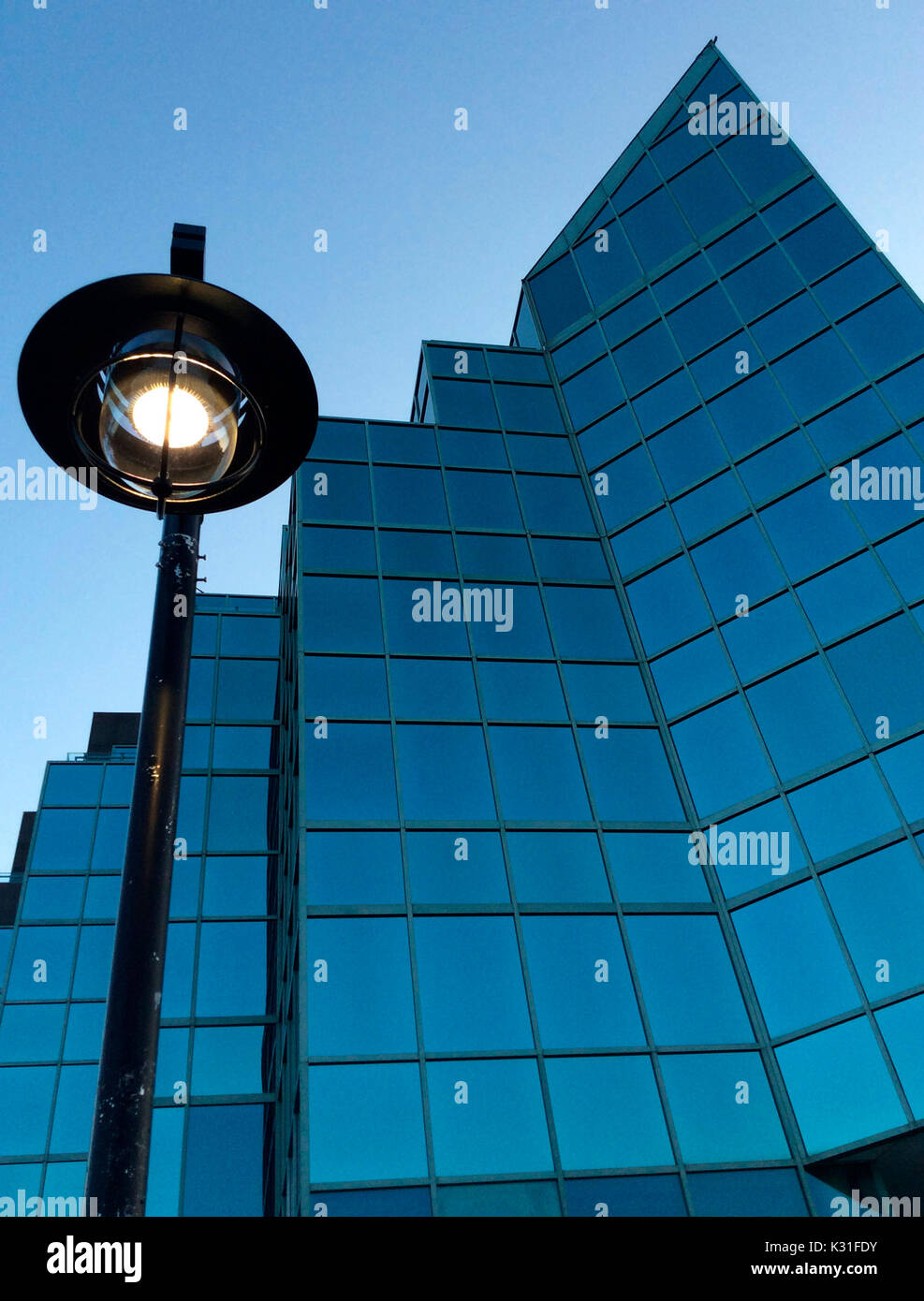 Modern glass architecture in blue, symbolizing a maritime theme