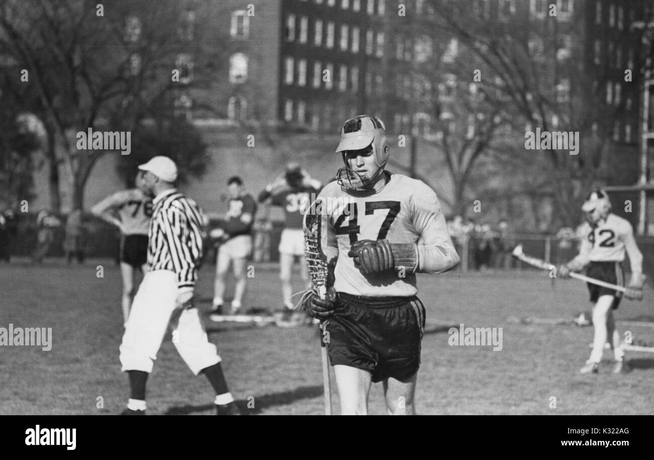 During a lacrosse game against Loyola, Johns Hopkins Co-captain and attackman Byron Forbush (no, June, 1951. 47) leaves the Homewood Field in Baltimore, Maryland. Stock Photo