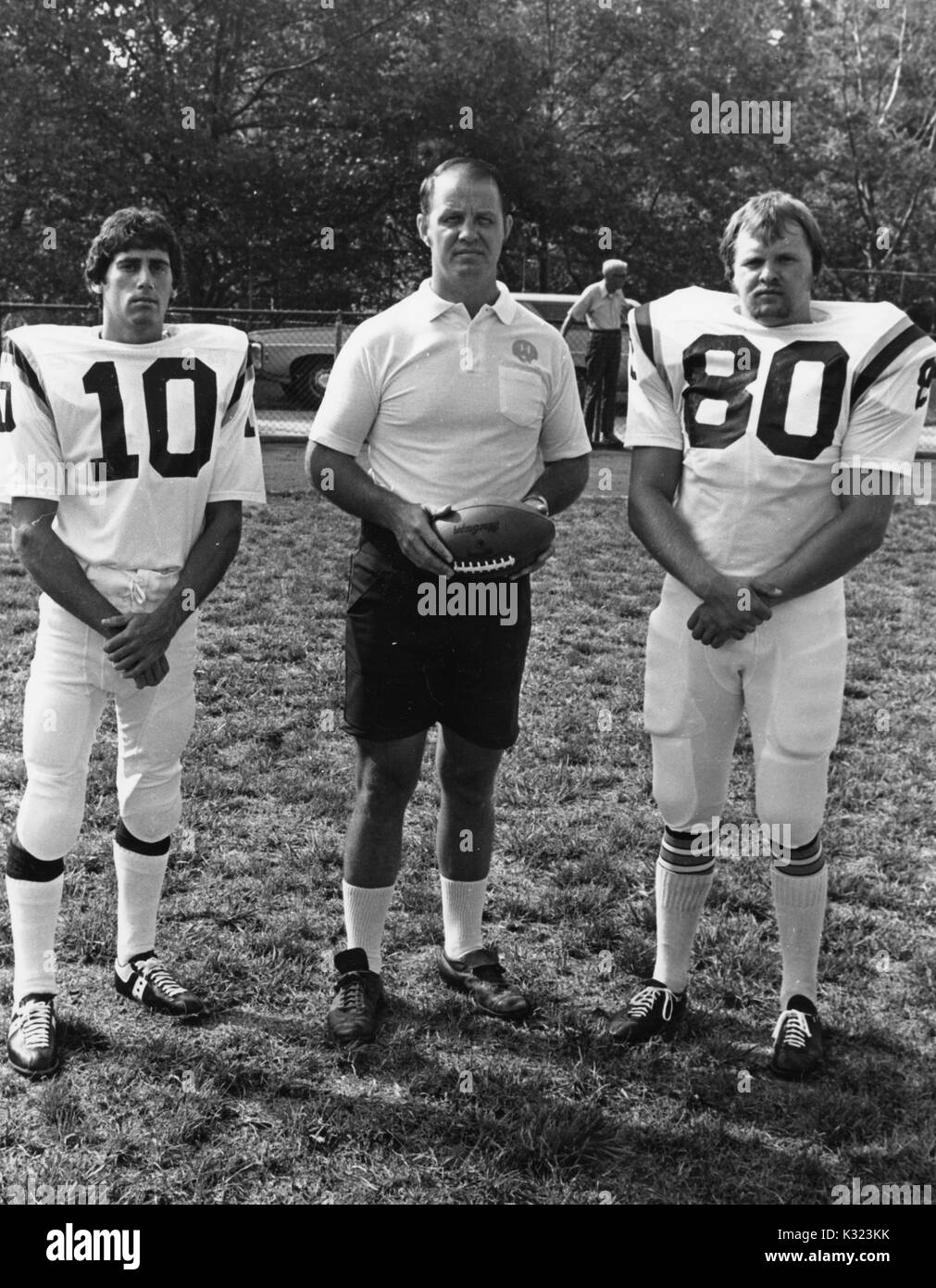 Johns Hopkins University Football Coach Denny Cox Holding A