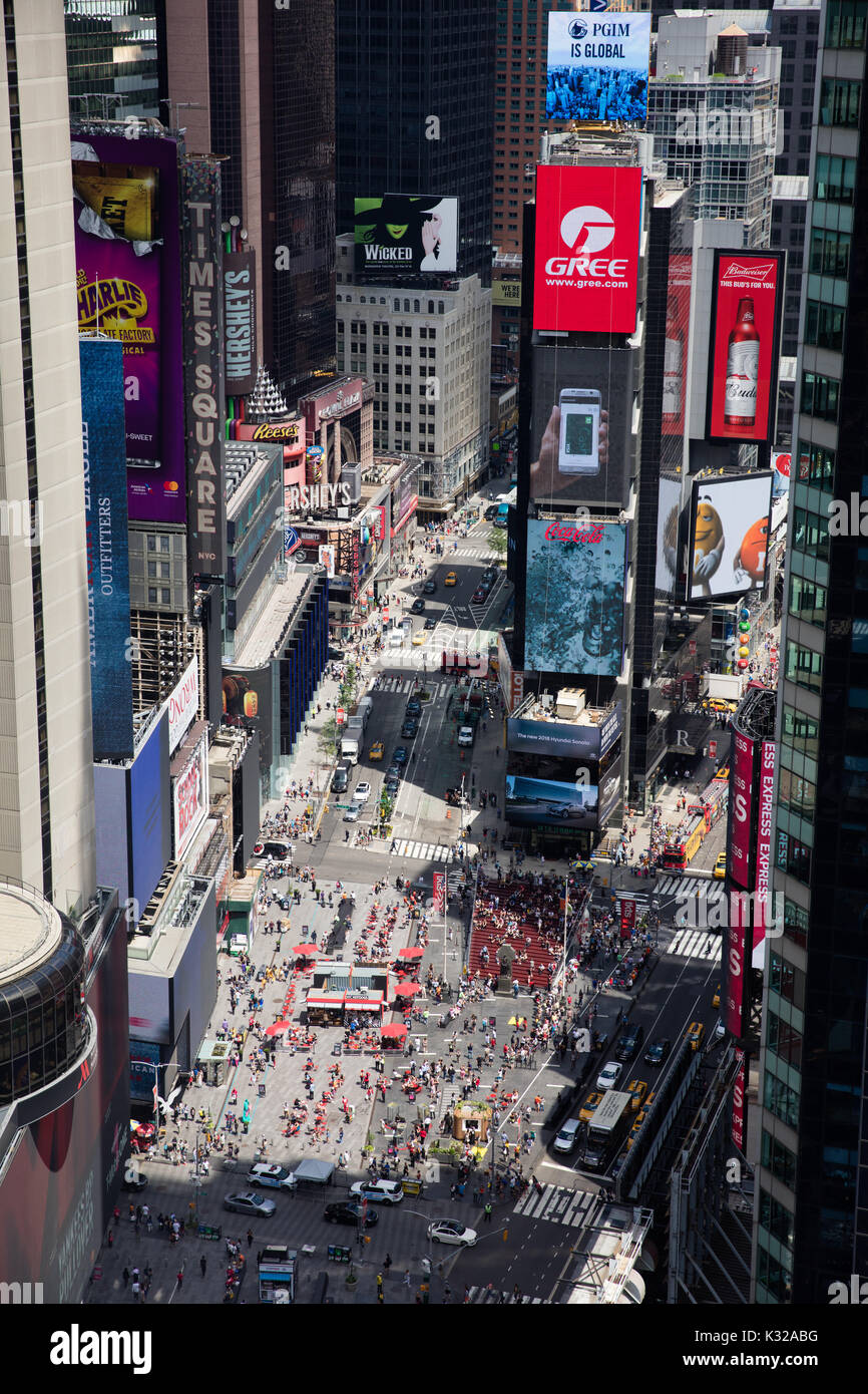Times Square in New York City (USA). Major tourist intersection and attraction during a rush hour. Stock Photo
