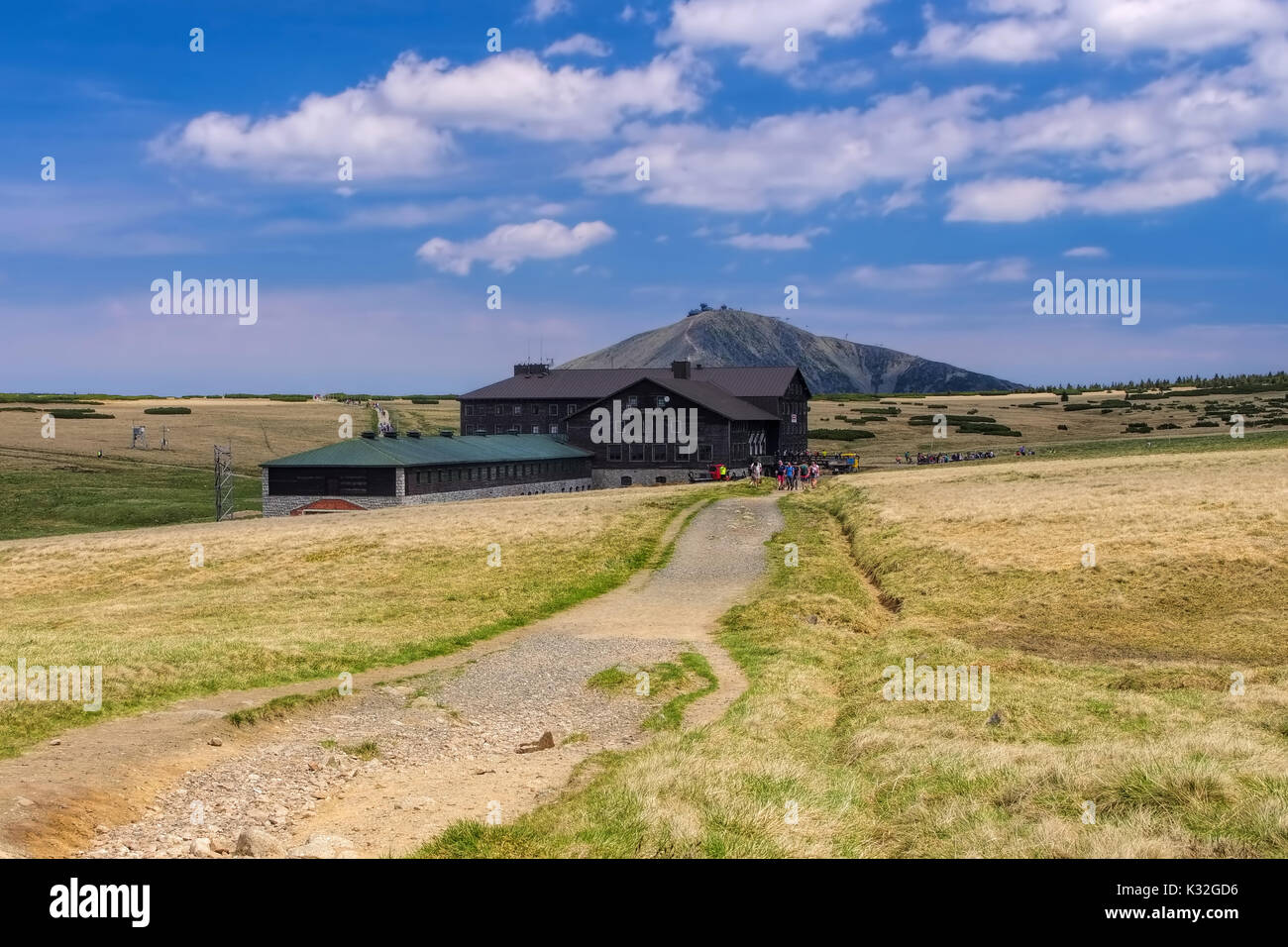 the mountain Sniezka and mountain hut Meadow Chalet in Giant Mountains Stock Photo