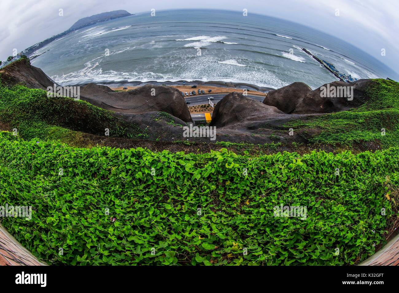 Surf, lookout and dock of the Waikiki beach of the tourist area of Miraflores in the capital city of Lima in Peru. Surfers, waves, sea, ocean open sea Stock Photo