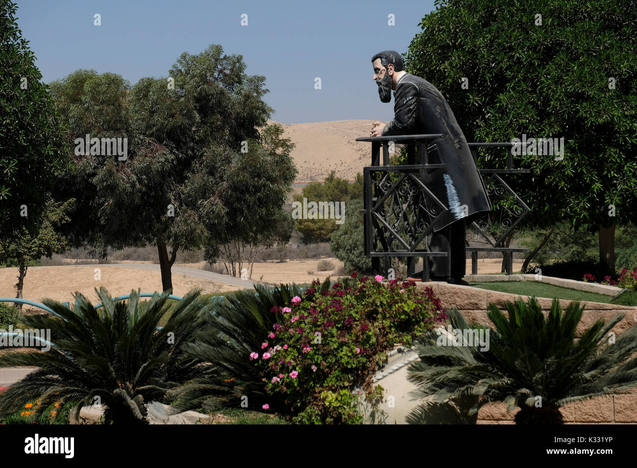 A sculpted figure depicting the founder of Zionism Theodor Herzl by Israeli artists Israel Benita ( 2012 ) placed at a roundabout in Herzl or Hertzel street the city of Dimona in the Negev desert southern Israel Stock Photo