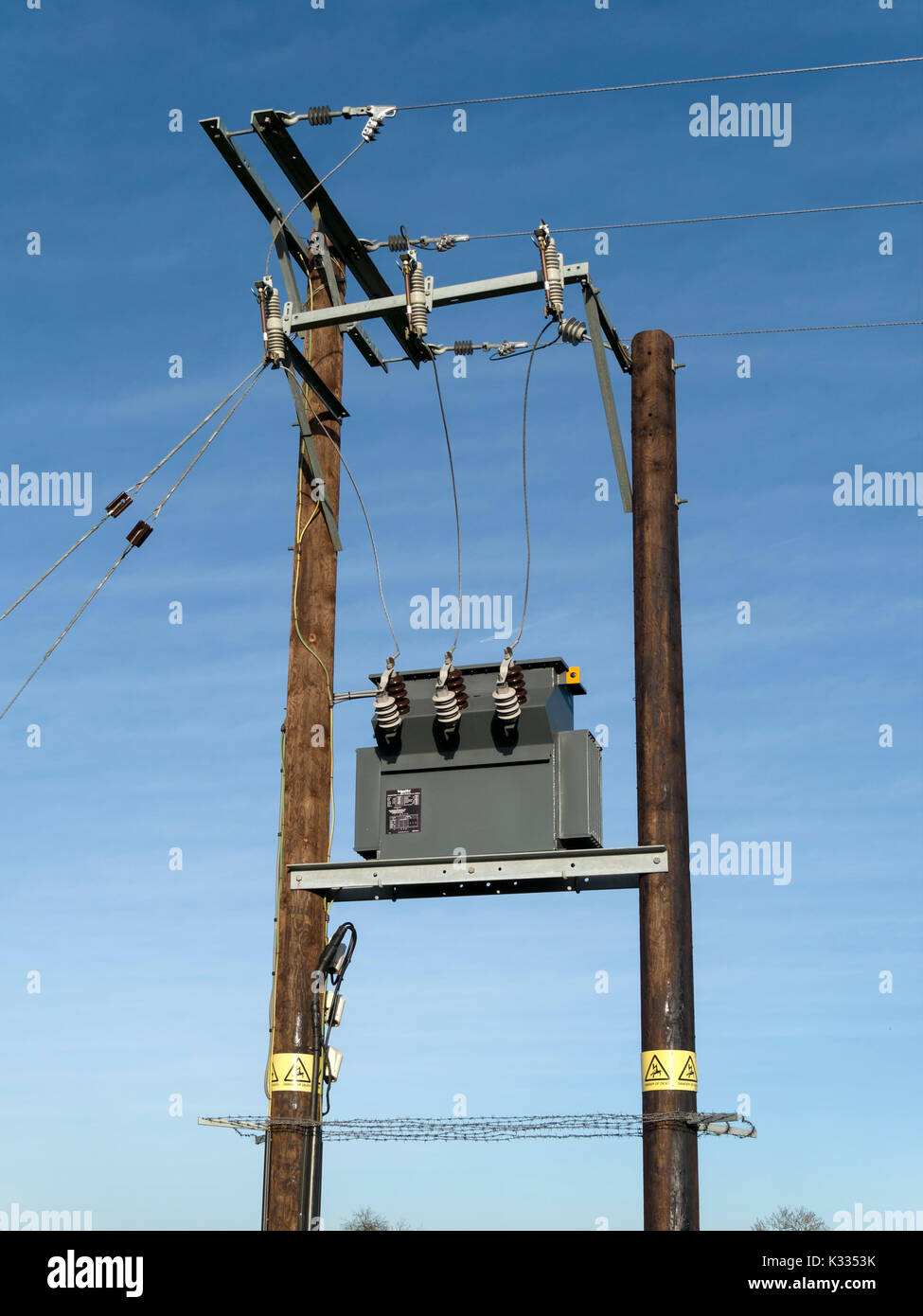 Schneider Electric pole mounted Electricity distribution high voltage transformer on UK National Grid Stock Photo