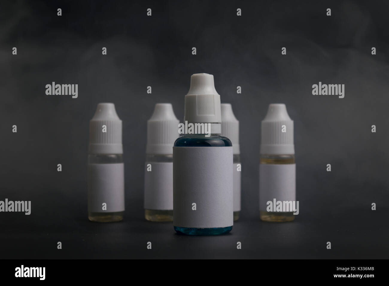 elfbar nachfüll pod läuft aus Isolated e-liquid for e cigarette or electronic cigarette with white lable  Stock Photo